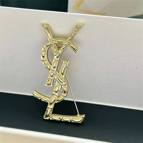 fake ysl pin|vintage ysl brooch.